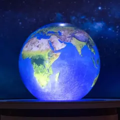 En lysande jordglob visar Afrika och Mellanöstern, med en stjärnklar bakgrund. Känns det som att jorden snurrar snabbare?