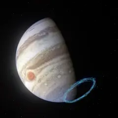 Jupiter genom teleskop, med den stora röda fläcken och en blåaktig virvel av energi.