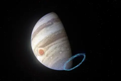 Jupiter genom teleskop, med den stora röda fläcken och en blåaktig virvel av energi.