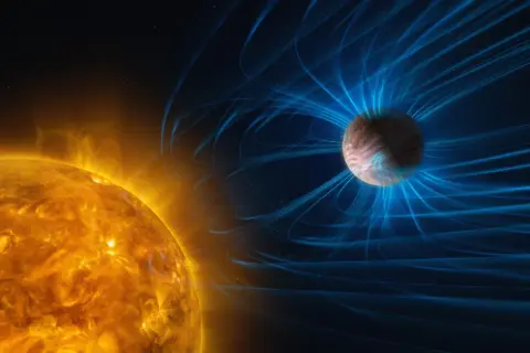 Solens glödande yta och Saturnus med sitt magnetfält. Bilden illustrerar solens enorma energi och avståndet från solen till Saturnus.