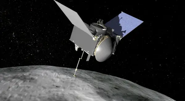 OSIRIS-REx rör vid Bennu, en asteroid, med sin robotarm.