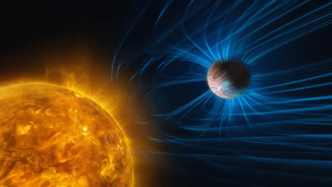Solens glödande yta och Saturnus med sitt magnetfält. Bilden illustrerar solens enorma energi och avståndet från solen till Saturnus.