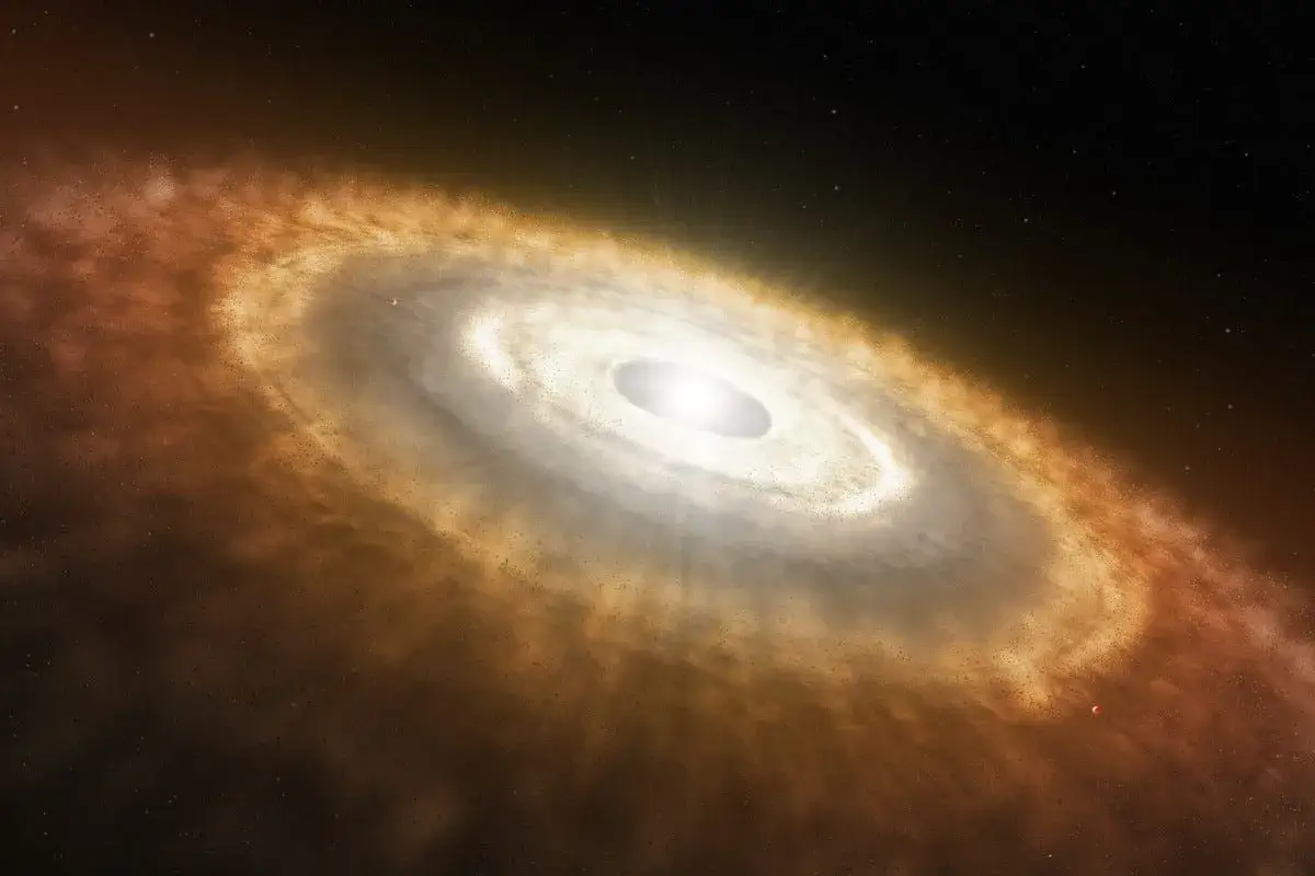 En protoplanet&auml;r skiva runt en ung stj&auml;rna, d&auml;r planeter bildas. Denna skiva kan ge oss ledtr&aring;dar om solen &aring;lder och hur v&aring;rt eget solsystem en g&aring;ng s&aring;g ut.