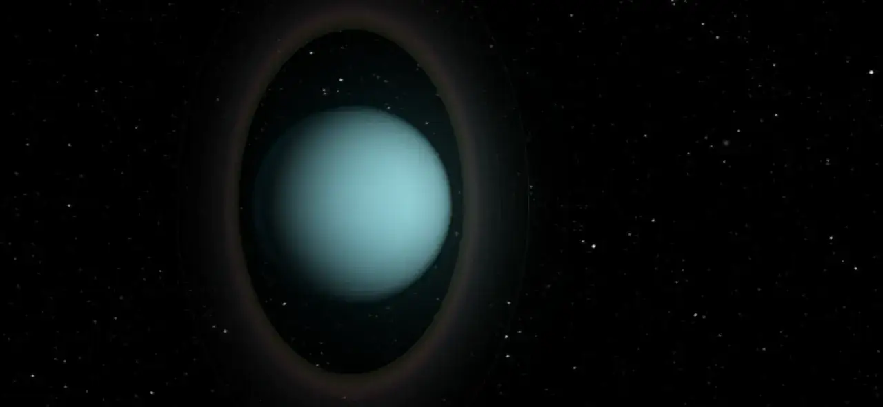 En blågrön planet, Uranus, omgiven av svaga, mörka cirklar runt Uranus i rymden, med stjärnor i bakgrunden.