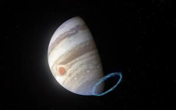 Jupiter genom teleskop, med den stora röda fläcken och en blåaktig virvel av energi.